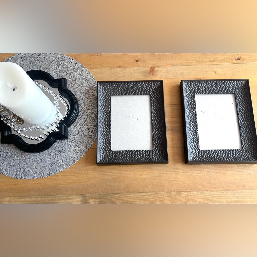 Two hammered bronze picture frames